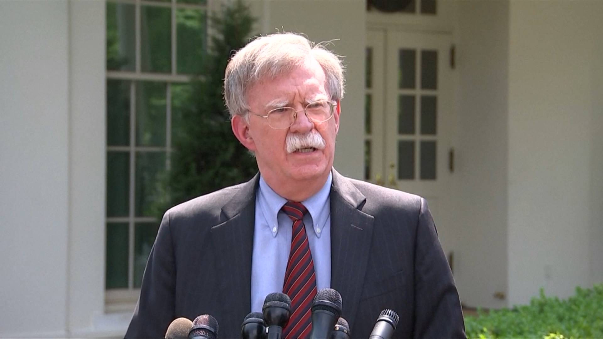 John Bolton Says He “Helped Plan Coups” in Foreign Countries