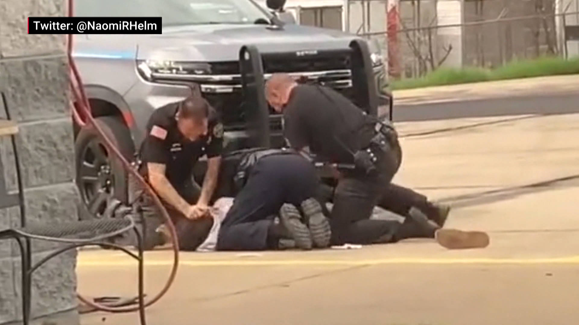 Arkansas Police Filmed Brutally Kicking & Punching Man on Sidewalk